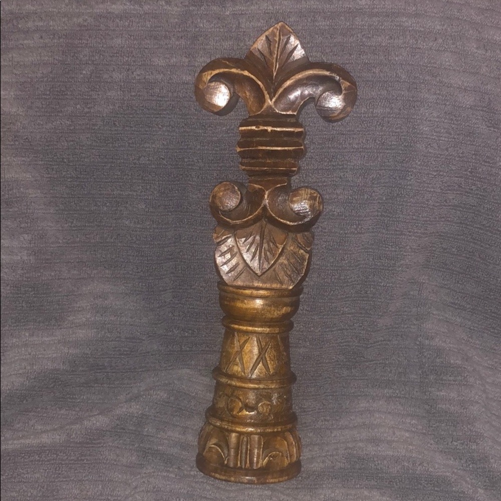 Wooden fleur de lis statue